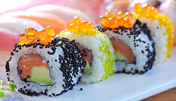 A salmon and avocado sushi roll