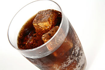 A glass of cola with ice