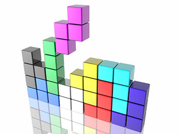 blocks falling together in the style of the computer game Tetris
