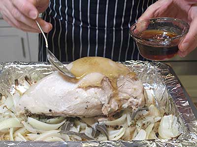 After basting, return the turkey to the oven and cook, uncovered, for another 30 to 45 minutes.