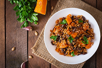 a beans and rice dish with butternut squash