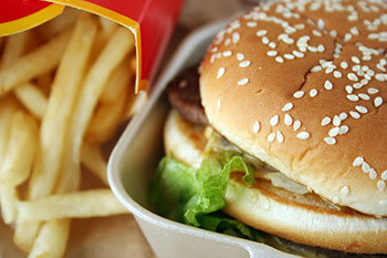 a fast food hamburger and french fries
