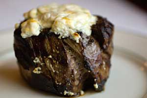 a filet of beef topped with blue cheese - click for the recipe!