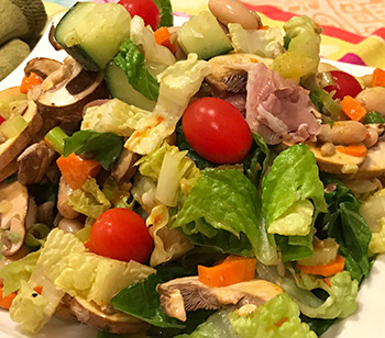 a fresh salad dressed with a vinaigrette using one of the mustards in the Christmas Basket