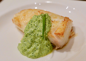 Cilantro Garlic Sauce served on a piece of roasted halibut