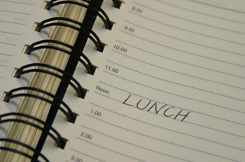 a page in a day planner with 'lunch' penciled in